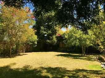 Medium Sized Bedroom in Charming Home, Surrounded By Vibrant Gardens 1