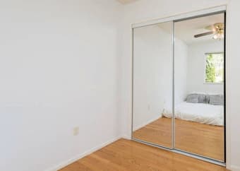 Corner Room With Large Window, Full-Mirror Closet - The Facebook House 2