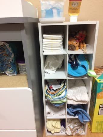 Changing station: changing table, pad, shelves, diaper pail, stool 2