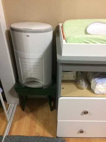 Changing station: changing table, pad, shelves, diaper pail, stool 3