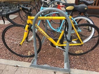 Bike fully equipped with lock, lights, helmet, and pump 1