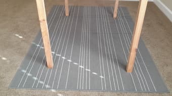 Nice carpet by sofa or under kitchen table! 1