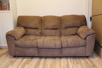 brown three seater couch / sofa 1
