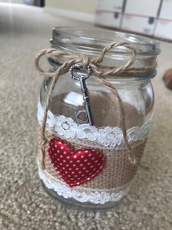Beautifully decorated mason jar with burlap, rustic heart 1