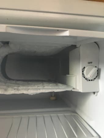 Minifridge clean, white, has freezer compartment -> 60 OBO, negotiable 3