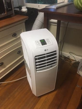 Portable AC and Kitchen hutch, $75, $25 respectively 1