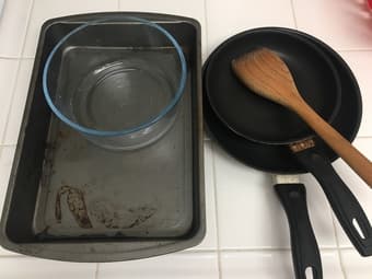 one ovenware, two pans, one glass bowl 1