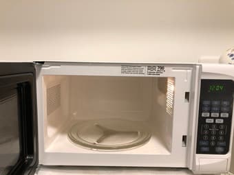 Moving Sale!  Sunbeam Microwave with frame 3