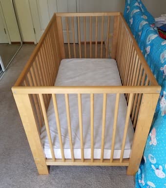 IKEA wooden baby crib/toddler bed with mattress 1