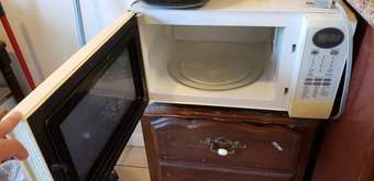 Microwave over, chair, side table, clothes rack 1