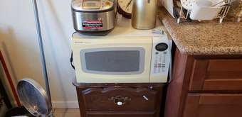 Microwave over, chair, side table, clothes rack 3