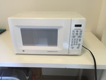 Moving Sale: GE microwave oven-75 2
