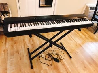 Casio Privia PX160BK 88-key digital piano with a double-X stand 1