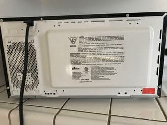 Oster OGB81103 1000Watt 1.1 CuFt Countertop Micrwave Oven - Black 3