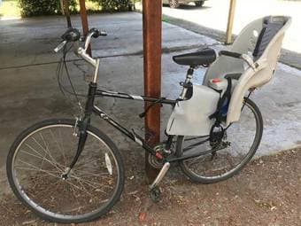 Two hybrid bikes with child seats and heavy duty locks, $150 OBO 2