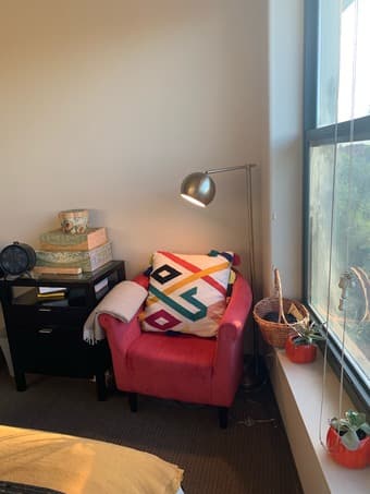 Red Sofa Chair w/ Decorative Pillow 1