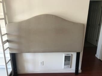 Beige upholstered queen size headboard 1