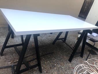 Sleek white table with wooden legs, barely used 1