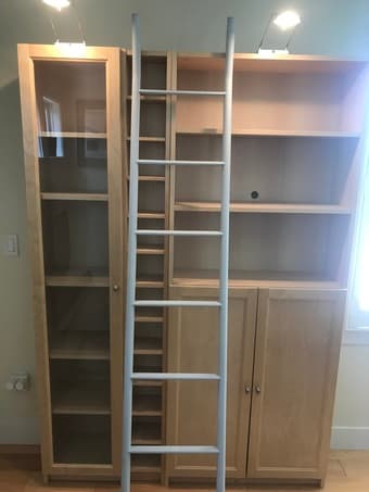 IKEA bookcase with overhead lights/ladder/glass cabinets 1