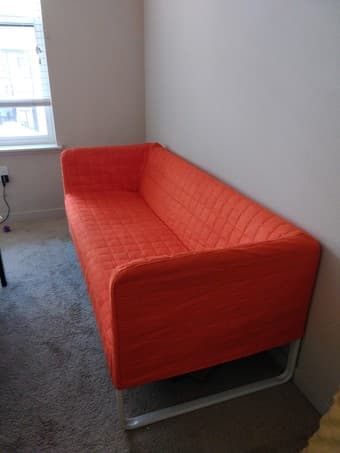 Beautiful bright orange Ikea sofa! 1