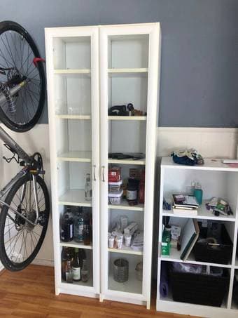 Tall white cabinet with glass doors 1