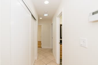 There are marble and solid hardwood flooring throughout the house. 3