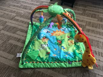 Baby diaper odor killer and baby Fisher Price rainforest gym, $5 3