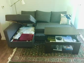 Sectional sofa bed w/storage; coffee table w/storage; kitchen stools 2