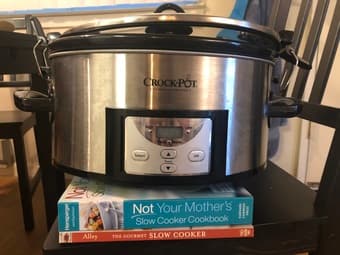 Crockpot with 2 slow cooker cookbooks - $30 1