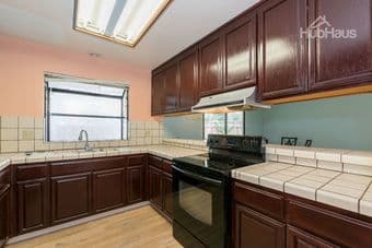A charming South Bay home with a backyard, garage, and balcony! 2