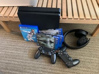 Playstation 4, 2 controllers, wireless headphones 4 games - $450 1