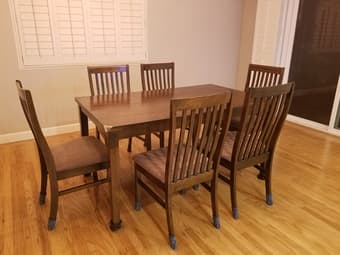 Wooden dining table and 6 chairs for sale 1