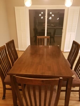 Wooden dining table and 6 chairs for sale 2