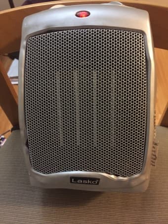 car seat, space heater, fan 2