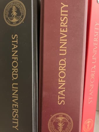 10 binders (7-8 are Stanford binders) 1