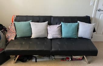 Black faux leather futon - $100 - one year old, like new 1