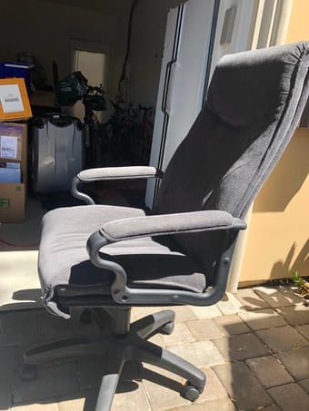 Grey fabric wheeled desk chair - $10 1