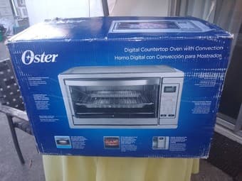Oster countertop convection toaster oven - new 1