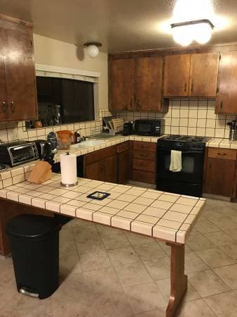 Spacious bedroom with private bathroom in two story house 1