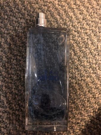 perfume, TI calculator, alarm 2