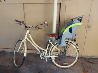 bicycle with kids carrier like new 1