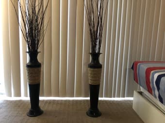 Tall vases with decorative twigs for home decor 1