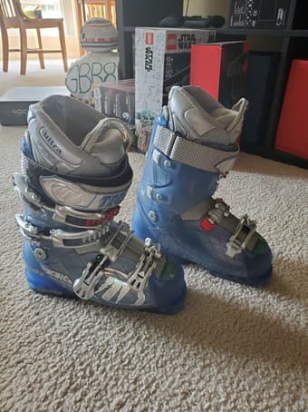 Skis with bindings and poles in great condition ($250), + gear 3