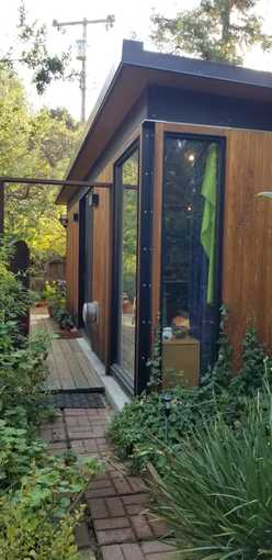 Quiet fully furnished studio/cottage with patio 1