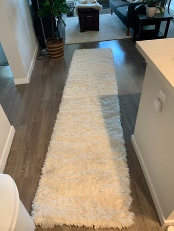 Beautiful white rug, grey rug, rock-climbing shoes, lights and more! 1