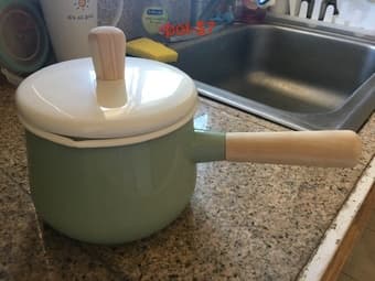 green pot, nasal wash, white blanket 1