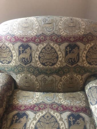 Twin comfortable medieval style revival armchairs 1