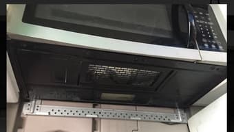 Over-Stove Microwave Oven with Lights and Vent Fans. 3