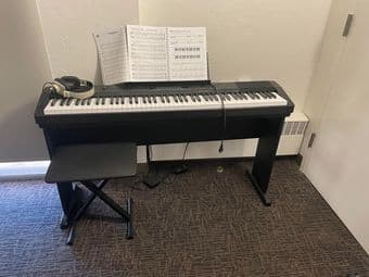 Casio Piano with seat, paddle, and headphone 1