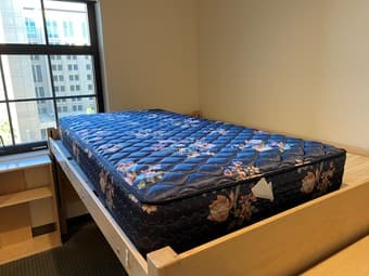 Two twin size mattresses and a bed frame 2